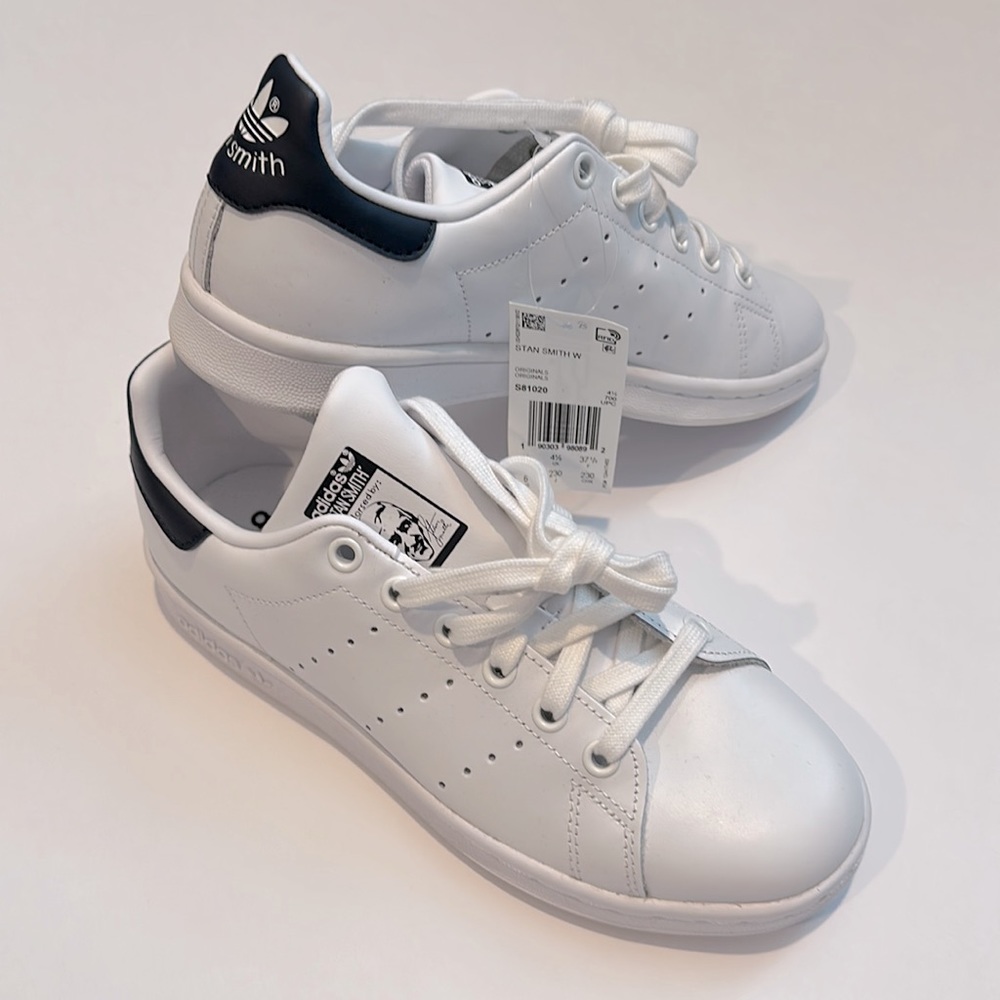 NIB Adidas sneakers.